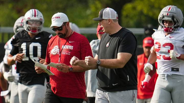Ohio State Buckeyes offensive coordinator Arthur Smith talks to head coach Ryan Day during the first practice of training camp at the Woody Hayes Athletic Center in Columbus on Aug. 6, 2026. Ohio State Buckeyes offensive coordinator Arthur Smith talks to head coach Ryan Day during the first practice of training camp at the Woody Hayes Athletic Center in Columbus on Aug. 6, 2026.