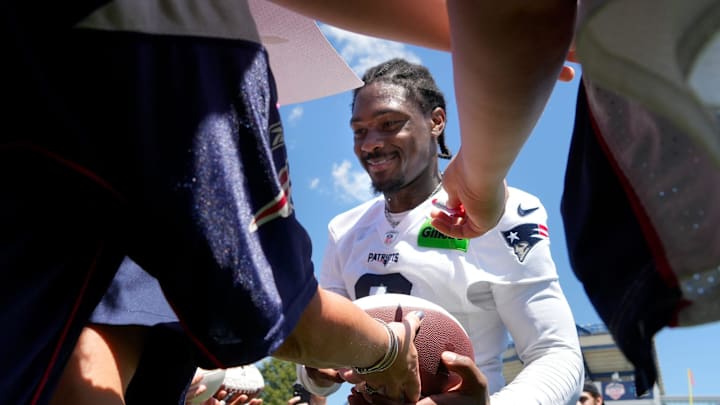 New England Patriots wide receiver Stefon Diggs chats with fans and and signs autographs after practice on the opening day of New England Patriots training camp on July 23, 2025, at Gillette Stadium in Foxboro, Massachusetts. New England Patriots wide receiver Stefon Diggs chats with fans and and signs autographs after practice on the opening day of New England Patriots training camp on July 23, 2025, at Gillette Stadium in Foxboro, Massachusetts.