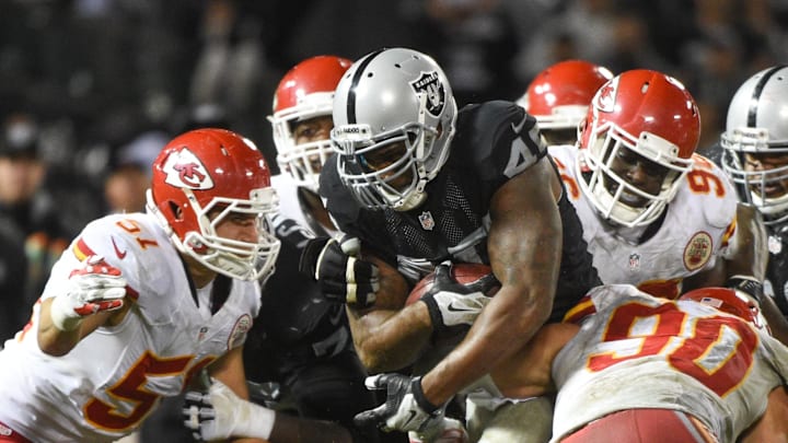 November 20, 2014; Oakland, CA, USA; Oakland Raiders fullback Marcel Reece (45) runs with the football during the fourth quarter against the Kansas City Chiefs at O.co Coliseum. The Raiders defeated the Chiefs 24-20. Mandatory Credit: Kyle Terada-Imagn Images