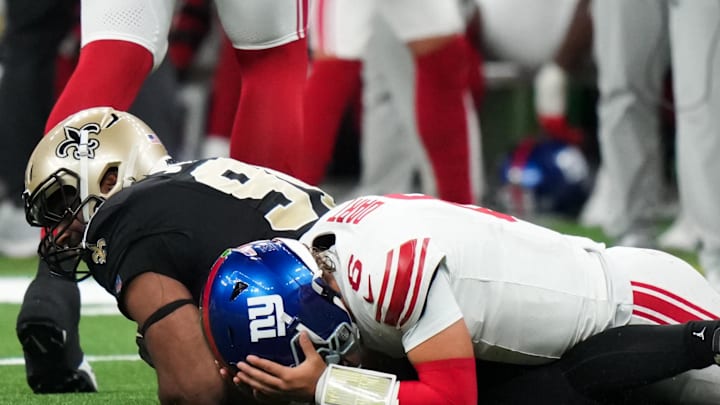 Oct 5, 2025; New Orleans, Louisiana, USA; New York Giants quarterback Jaxson Dart (6) reacts after fumbling the ball against the New Orleans Saints during the third quarter at Caesars Superdome. Oct 5, 2025; New Orleans, Louisiana, USA; New York Giants quarterback Jaxson Dart (6) reacts after fumbling the ball against the New Orleans Saints during the third quarter at Caesars Superdome.