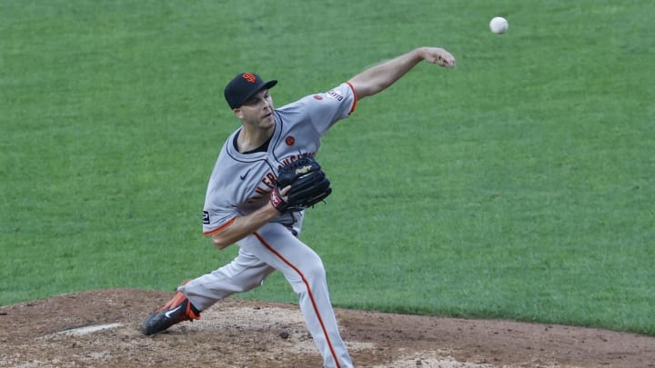 San Francisco Giants relief pitcher Taylor Rogers (33) pitches against the Washington Nationals during the tenth inning at Nationals Park in 2024.
