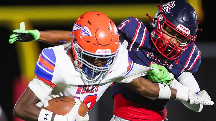 Bradenton Southeast Seminoles receiver Tavares Powell (19) tries to break a tackle from Aubrey Rogers Patriots defensive back Trevon James (5) during the third quarter of a game at Aubrey Rogers High School in Naples on Friday, Nov. 1, 2024.