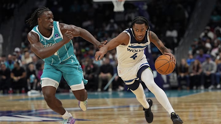 Nov 1, 2025; Charlotte, North Carolina, USA; Minnesota Timberwolves guard Rob Dillingham (4) drives to the basket against Charlotte Hornets guard Sion James (4) during the second half at Spectrum Center. Mandatory Credit: Jim Dedmon-Imagn Images Nov 1, 2025; Charlotte, North Carolina, USA; Minnesota Timberwolves guard Rob Dillingham (4) drives to the basket against Charlotte Hornets guard Sion James (4) during the second half at Spectrum Center. Mandatory Credit: Jim Dedmon-Imagn Images