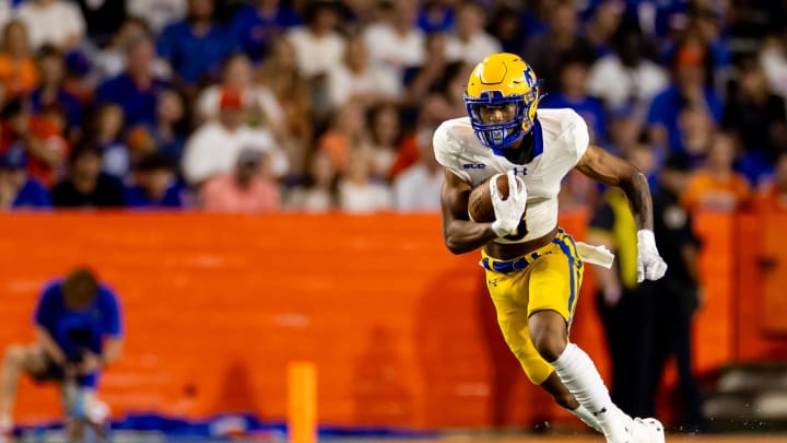 Sep 9, 2023; Gainesville, Florida, USA; McNeese State Cowboys wide receiver Makhi Paris (8) runs with the ball during the second half against the Florida Gators at Ben Hill Griffin Stadium. Mandatory Credit: Matt Pendleton-USA TODAY Sports Sep 9, 2023; Gainesville, Florida, USA; McNeese State Cowboys wide receiver Makhi Paris (8) runs with the ball during the second half against the Florida Gators at Ben Hill Griffin Stadium. Mandatory Credit: Matt Pendleton-USA TODAY Sports