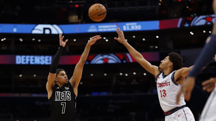 Feb 24, 2025; Washington, District of Columbia, USA; Brooklyn Nets guard Killian Hayes (7) shoots the ball over Washington Wizards guard Jordan Poole (13) in the first half at Capital One Arena. Mandatory Credit: Geoff Burke-Imagn Images Feb 24, 2025; Washington, District of Columbia, USA; Brooklyn Nets guard Killian Hayes (7) shoots the ball over Washington Wizards guard Jordan Poole (13) in the first half at Capital One Arena. Mandatory Credit: Geoff Burke-Imagn Images