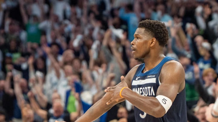 Apr 27, 2025; Minneapolis, Minnesota, USA; Minnesota Timberwolves guard Anthony Edwards (5) celebrates a three pointer against the Los Angeles Lakers in the fourth quarter during game four of first round for the 2025 NBA Playoffs at Target Center. Mandatory Credit: Matt Blewett-Imagn Images