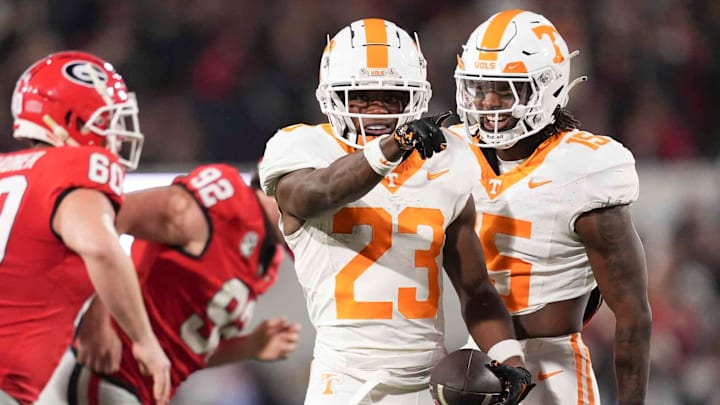 Tennessee defensive back Boo Carter (23) celebrates with Tennessee defensive back Edrees Farooq (15) after returning a punt during a college football game between Tennessee and Georgia at Sanford Stadium in Athens, Ga., on Saturday, November 16, 2024. Tennessee defensive back Boo Carter (23) celebrates with Tennessee defensive back Edrees Farooq (15) after returning a punt during a college football game between Tennessee and Georgia at Sanford Stadium in Athens, Ga., on Saturday, November 16, 2024.