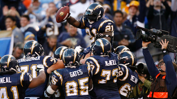 San Diego's LaDainian Tomlinson is lifted into the air after scoring his 30th of the season in 2006.