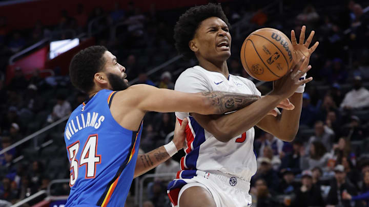Jan 28, 2024; Detroit, Michigan, USA; Detroit Pistons forward Ausar Thompson (9) is fouled by Oklahoma City Thunder forward Kenrich Williams (34) in the second half at Little Caesars Arena. Mandatory Credit: Rick Osentoski-Imagn Images Jan 28, 2024; Detroit, Michigan, USA; Detroit Pistons forward Ausar Thompson (9) is fouled by Oklahoma City Thunder forward Kenrich Williams (34) in the second half at Little Caesars Arena. Mandatory Credit: Rick Osentoski-Imagn Images