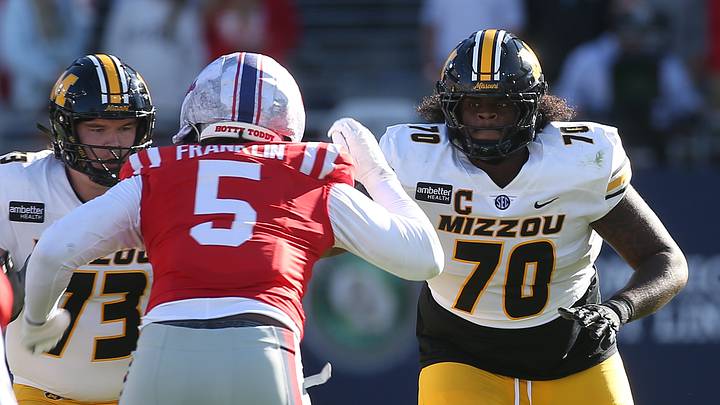 Oct 17, 2026; Oxford, Mississippi, USA;  Missouri Tigers offensive line Cayden Green (70) and offensive line Tristan Wilson (73) block against Mississippi Rebels defensive end Kam Franklin (5) during the first half at Vaught-Hemingway Stadium.  Mandatory Credit: Petre Thomas-Imagn Images