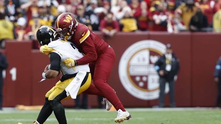 Nov 10, 2024; Landover, Maryland, USA; Pittsburgh Steelers quarterback Russell Wilson (3) is sacked by Washington Commanders linebacker Dante Fowler Jr. (6) during the second half at Northwest Stadium. Mandatory Credit: Geoff Burke-Imagn Images