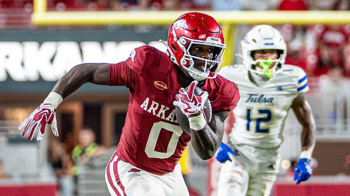 Arkansas Razorbacks running back Braylen Russell looking downfield on long run after the catch against Tulsa. Arkansas Razorbacks running back Braylen Russell looking downfield on long run after the catch against Tulsa.