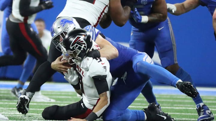 Detroit Lions defensive end Aidan Hutchinson (97) sacks Atlanta Falcons quarterback Desmond Ridder