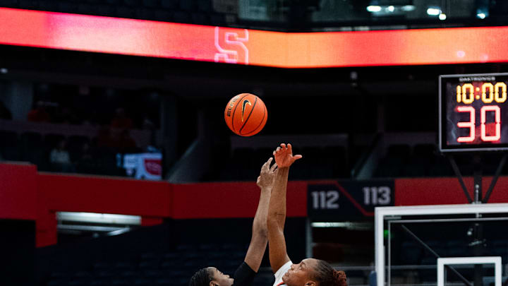 Syracuse basketball women's and men's centers Uche Izoje and William Kyle III are in the running for a top defensive honor.