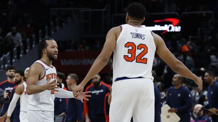 Dec 28, 2024; Washington, District of Columbia, USA; New York Knicks guard Jalen Brunson (11) celebrates with Knicks center Karl-Anthony Towns (32) against the Washington Wizards in the fourth quarter at Capital One Arena. Mandatory Credit: Geoff Burke-Imagn Images