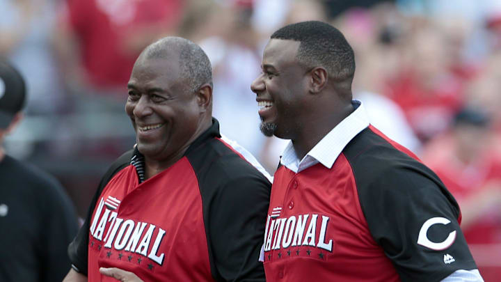 Ken Griffey Sr. and Ken Griffey Jr. head back to the clubhouse after throwing out and catching the ceremonial first pitch for the Home Run Derby on July 13, 2015.