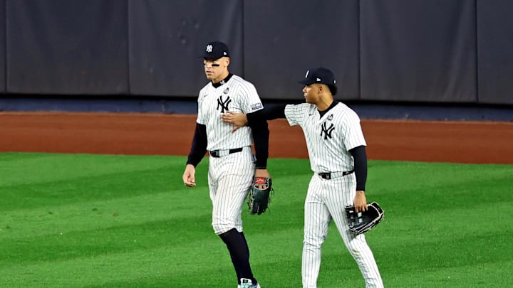 Oct 30, 2024; Bronx, New York, USA; New York Yankees outfielder Juan Soto (22) reacts with outfielder Aaron Judge (99) after Judge dropped a fly ball during the fifth inning against the Los Angeles Dodgers during game five of the 2024 MLB World Series at Yankee Stadium. Mandatory Credit: James Lang-Imagn Images Oct 30, 2024; Bronx, New York, USA; New York Yankees outfielder Juan Soto (22) reacts with outfielder Aaron Judge (99) after Judge dropped a fly ball during the fifth inning against the Los Angeles Dodgers during game five of the 2024 MLB World Series at Yankee Stadium. Mandatory Credit: James Lang-Imagn Images