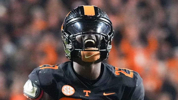 Tennessee defensive lineman James Pearce Jr. (27) yells out in celebration after sacking Kentucky quarterback Brock Vandagriff (12) during an NCAA college football game between Tennessee and Kentucky on Saturday, Nov. 2, 2024, in Knoxville, Tenn.