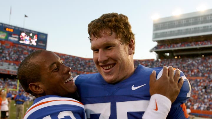 Sep 30, 2006; Gainesville, FL, USA; Florida Gators quarterback Chris Leak celebrates with offensive lineman (75) Phil Trautwein after the Gators defeated the Alabama Crimson Tide 28-13 at Ben Hill Griffin Stadium in Gainesville, FL. Mandatory Credit: Jason Parkhurst-Imagn Images Copyright © (2006) Jason Parkhurst 