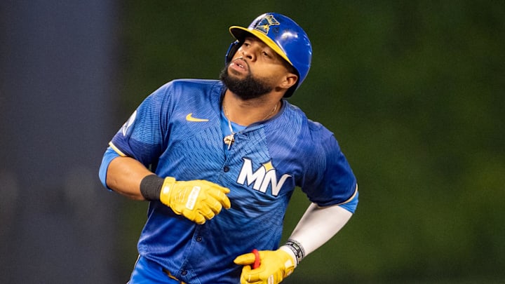Minnesota Twins first baseman Carlos Santana (30) is tagged out on the bases in the ninth inning by Baltimore Orioles third baseman Ramon Urias (29) at Target Field on Sept 27. Minnesota Twins first baseman Carlos Santana (30) is tagged out on the bases in the ninth inning by Baltimore Orioles third baseman Ramon Urias (29) at Target Field on Sept 27.