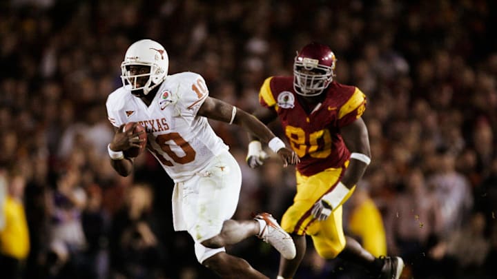 Jan 4, 2006; Pasadena, CA, USA: FILE PHOTO; Texas Longhorns quarterback Vince Young (10) in action against the Southern California Trojans during the 2006 Rose Bowl at the Rose Bowl. The Longhorns defeated the Trojans 41-38. Mandatory Credit: Richard Mackson-USA TODAY Network