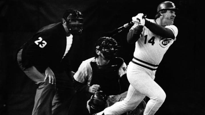SEPTEMBER 11, 1985: Umpire Lee Weyer and San Diego catcher Bruce Bochy have the best seats in the house as Pete Rose slaps hit No. 4,192 to break Ty Cobb's Record.

Pete Rose 15