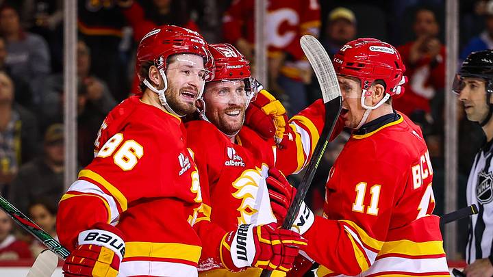 Apr 14, 2026; Calgary, Alberta, CAN; Calgary Flames left wing Blake Coleman (20) celebrates his goal with teammates against the Colorado Avalanche during the second period at Scotiabank Saddledome. Mandatory Credit: Sergei Belski-Imagn Images