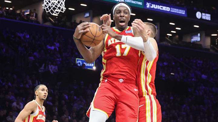 Oct 29, 2025; Brooklyn, New York, USA; Atlanta Hawks forward Onyeka Okongwu (17) grabs a rebound in the second quarter against the Brooklyn Nets at Barclays Center. Mandatory Credit: Wendell Cruz-Imagn Images