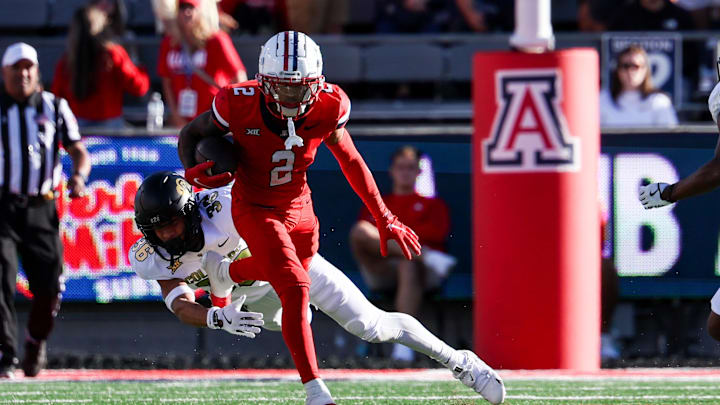 Oct 19, 2024; Tucson, Arizona, USA; Arizona Wildcats wide receiver Jeremiah Patterson (2) runs with ball against the Colorado Buffaloes during the fourth quarter at Arizona Stadium. Mandatory Credit: Aryanna Frank-Imagn Images