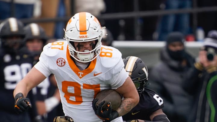Tennessee tight end Miles Kitselman (87) is stopped by Vanderbilt cornerback Kolbey Taylor (6) during the second quarter at FirstBank Stadium in Nashville, Tenn., Saturday, Nov. 30, 2024. Tennessee tight end Miles Kitselman (87) is stopped by Vanderbilt cornerback Kolbey Taylor (6) during the second quarter at FirstBank Stadium in Nashville, Tenn., Saturday, Nov. 30, 2024.