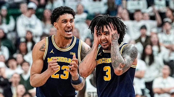 Michigan guard Elliot Cadeau (3) and forward Yaxel Lendeborg (23)