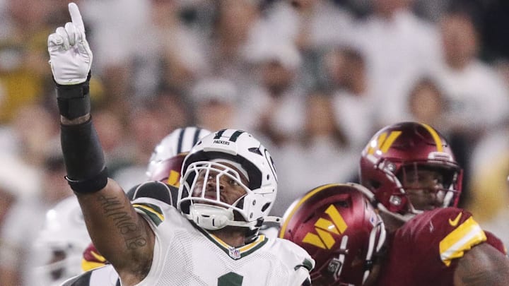 Sep 11, 2025; Green Bay, Wisconsin, USA; Green Bay Packers defensive end Micah Parsons (1) celebrates after sacking Washington Commanders quarterback Jayden Daniels at Lambeau Field. Mandatory Credit: Tork Mason-USA TODAY Network via Imagn Images