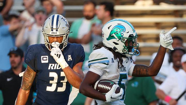 Oct 28, 2023; Houston, Texas, USA; Tulane Green Wave wide receiver Yulkeith Brown (5) reacts after a making a first down against Rice Owls linebacker Myron Morrison (33) in the second half at Rice Stadium. Mandatory Credit: Thomas Shea-USA TODAY Sports Oct 28, 2023; Houston, Texas, USA; Tulane Green Wave wide receiver Yulkeith Brown (5) reacts after a making a first down against Rice Owls linebacker Myron Morrison (33) in the second half at Rice Stadium. Mandatory Credit: Thomas Shea-USA TODAY Sports