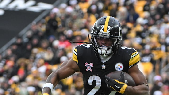 Dec 25, 2024; Pittsburgh, Pennsylvania, USA; Pittsburgh Steelers running back Najee Harris (22) runs against the Kansas City Chiefs during the second half at Acrisure Stadium. Mandatory Credit: Barry Reeger-Imagn Images