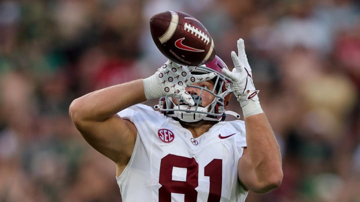 Sep 16, 2023; Tampa, Florida, USA; Alabama Crimson Tide tight end CJ Dippre (81) catches a pass against the South Florida Bulls in the third quarter at Raymond James Stadium. Mandatory Credit: Nathan Ray Seebeck-USA TODAY Sports Sep 16, 2023; Tampa, Florida, USA; Alabama Crimson Tide tight end CJ Dippre (81) catches a pass against the South Florida Bulls in the third quarter at Raymond James Stadium. Mandatory Credit: Nathan Ray Seebeck-USA TODAY Sports