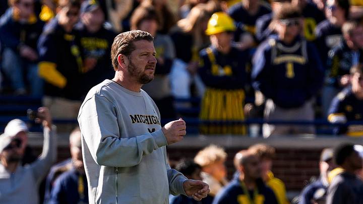 Michigan offensive coordinator Jason Beck watches warmup ahead of the game between Michigan and Penn State at Michigan Stadium in Ann Arbor on Saturday, Oct. 17, 2026. Michigan offensive coordinator Jason Beck watches warmup ahead of the game between Michigan and Penn State at Michigan Stadium in Ann Arbor on Saturday, Oct. 17, 2026.