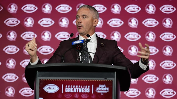 Jul 23, 2025; Charlotte, NC, USA; Florida State head coach Mike Norvell answers questions from the media during ACC Media days at Hilton Charlotte Uptown. Mandatory Credit: Jim Dedmon-Imagn Images
