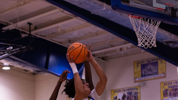 Charlotte's Jordan Taylor goes for the bank shot during Friday's 6A-11 District against Fort Myers

Fmvchs Boysbb 02102023 27