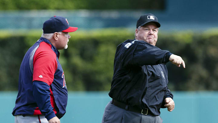 May 25, 2013; Detroit, MI, USA; MLB umpire Joe West (right) ejects Minnesota Twins manager Ron Gardenhire in the third inning against the Detroit Tigers at Comerica Park. Mandatory Credit: Rick Osentoski-Imagn Images