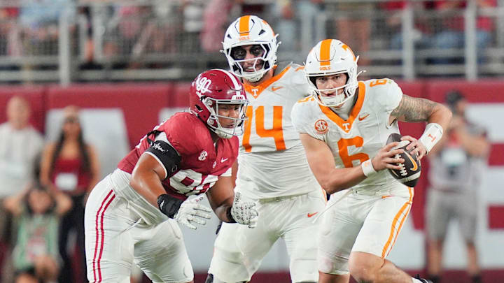 Tennessee quarterback Joey Aguilar (6) decides to run the ball during a college football game against Alabama at Bryant-Denny Stadium in Tuscaloosa, Ala., on Oct. 18, 2025. Tennessee quarterback Joey Aguilar (6) decides to run the ball during a college football game against Alabama at Bryant-Denny Stadium in Tuscaloosa, Ala., on Oct. 18, 2025.