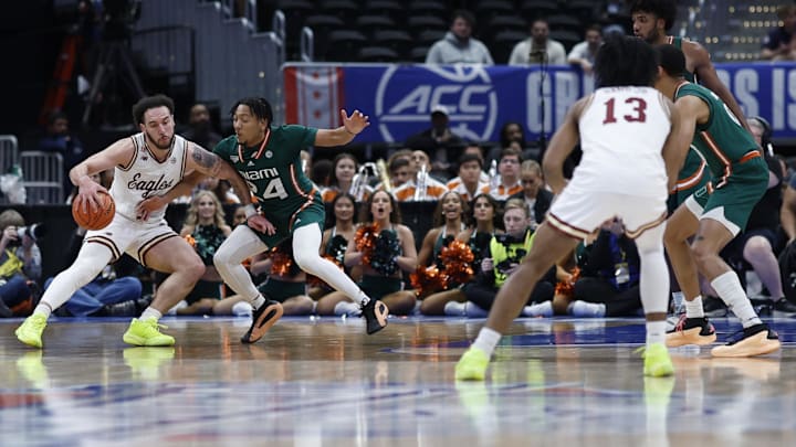 Mar 12, 2024; Washington, D.C., USA; Boston College Eagles guard Jaeden Zackery (3) dribbles the ball as Miami (Fl) Hurricanes guard Nijel Pack (24) defends in the first half at Capital One Arena. Mar 12, 2024; Washington, D.C., USA; Boston College Eagles guard Jaeden Zackery (3) dribbles the ball as Miami (Fl) Hurricanes guard Nijel Pack (24) defends in the first half at Capital One Arena.