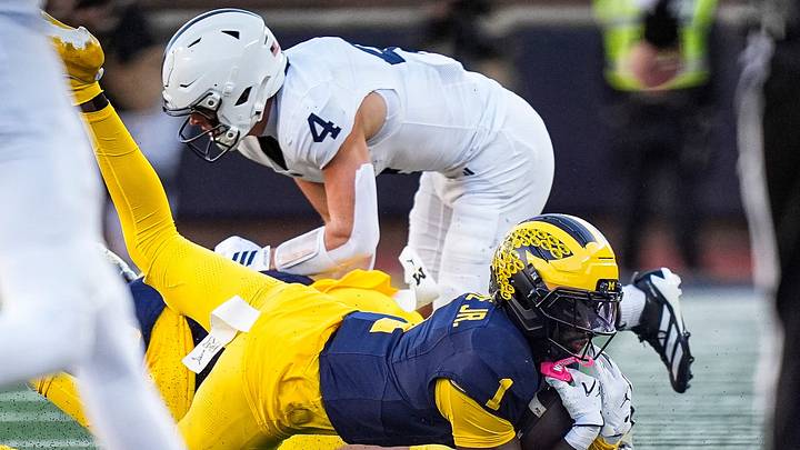 Michigan safety Rod Moore Jr. (1) intercepts a pass intended for Penn State wide receiver Brett Eskildsen (4) during the second half at Michigan Stadium in Ann Arbor on Saturday, Oct. 17, 2026.