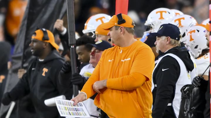Dec 30, 2025; Nashville, TN, USA; Tennessee Volunteers head coach Josh Heupel watches his team against the Illinois Fighting Illini during the first half at Nissan Stadium. Mandatory Credit: Steve Roberts-Imagn Images