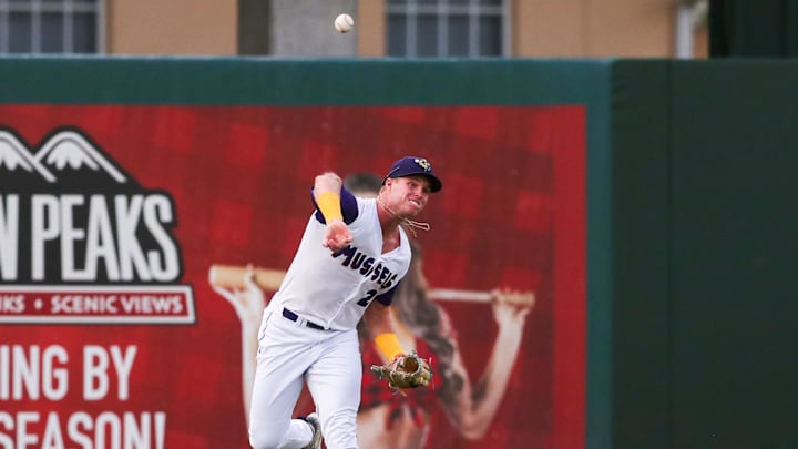 Fort Myers Mighty Mussels outfielder Walker Jenkins (27) throws a ball to the infield during the second inning of a game against the Tampa Tarpons at Hammond Stadium in Fort Myers on Friday, June 28, 2024.