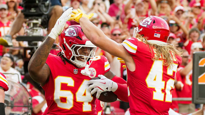 Sep 15, 2024; Kansas City, Missouri, USA; Kansas City Chiefs offensive tackle Wanya Morris (64) celebrates with running back Carson Steele (42) after scoring a touchdown during the second half against the Cincinnati Bengals at GEHA Field at Arrowhead Stadium. Mandatory Credit: Jay Biggerstaff-Imagn Images Sep 15, 2024; Kansas City, Missouri, USA; Kansas City Chiefs offensive tackle Wanya Morris (64) celebrates with running back Carson Steele (42) after scoring a touchdown during the second half against the Cincinnati Bengals at GEHA Field at Arrowhead Stadium. Mandatory Credit: Jay Biggerstaff-Imagn Images