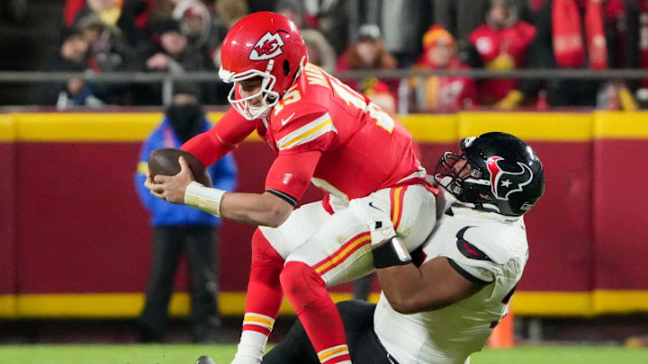 Dec 7, 2025; Kansas City, Missouri, USA; Kansas City Chiefs quarterback Patrick Mahomes (15) is sacked by Houston Texans defensive tackle Tommy Togiai (72) during the first quarter at GEHA Field at Arrowhead Stadium. Mandatory Credit: Denny Medley-Imagn Images Dec 7, 2025; Kansas City, Missouri, USA; Kansas City Chiefs quarterback Patrick Mahomes (15) is sacked by Houston Texans defensive tackle Tommy Togiai (72) during the first quarter at GEHA Field at Arrowhead Stadium. Mandatory Credit: Denny Medley-Imagn Images