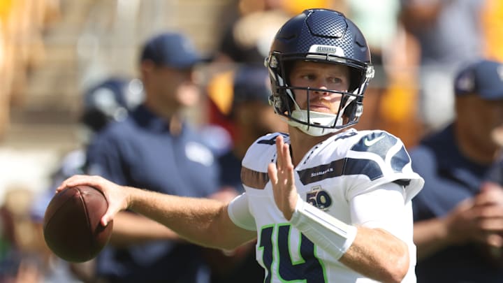 Sep 14, 2025; Pittsburgh, Pennsylvania, USA; Seattle Seahawks quarterback Sam Darnold (14) warms up before the game against the Pittsburgh Steelers at Acrisure Stadium. 
