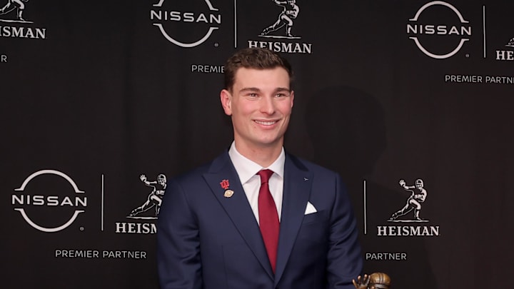 Dec 13, 2025; New York, NY, USA; Indiana Hoosiers quarterback Fernando Mendoza poses with the Heisman trophy during a press conference at the New York Marriott Marquis. Mandatory Credit: Brad Penner-Imagn Images Dec 13, 2025; New York, NY, USA; Indiana Hoosiers quarterback Fernando Mendoza poses with the Heisman trophy during a press conference at the New York Marriott Marquis. Mandatory Credit: Brad Penner-Imagn Images