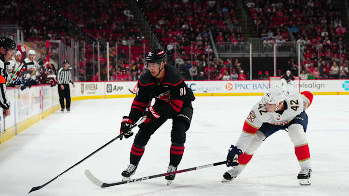 Feb 22, 2024; Raleigh, North Carolina, USA; Carolina Hurricanes center Martin Necas (88) tries to