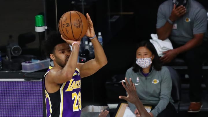 Aug 8, 2020; Lake Buena Vista, Florida, USA; Los Angeles Lakers guard Quinn Cook (28) shoots the ball against Indiana Pacers guard Victor Oladipo (4) during the second quarter in a NBA basketball game at The Field House. Mandatory Credit: Kim Klement-USA TODAY Sports Aug 8, 2020; Lake Buena Vista, Florida, USA; Los Angeles Lakers guard Quinn Cook (28) shoots the ball against Indiana Pacers guard Victor Oladipo (4) during the second quarter in a NBA basketball game at The Field House. Mandatory Credit: Kim Klement-USA TODAY Sports